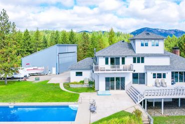 Luxury residential home with pool and mountain backdrop